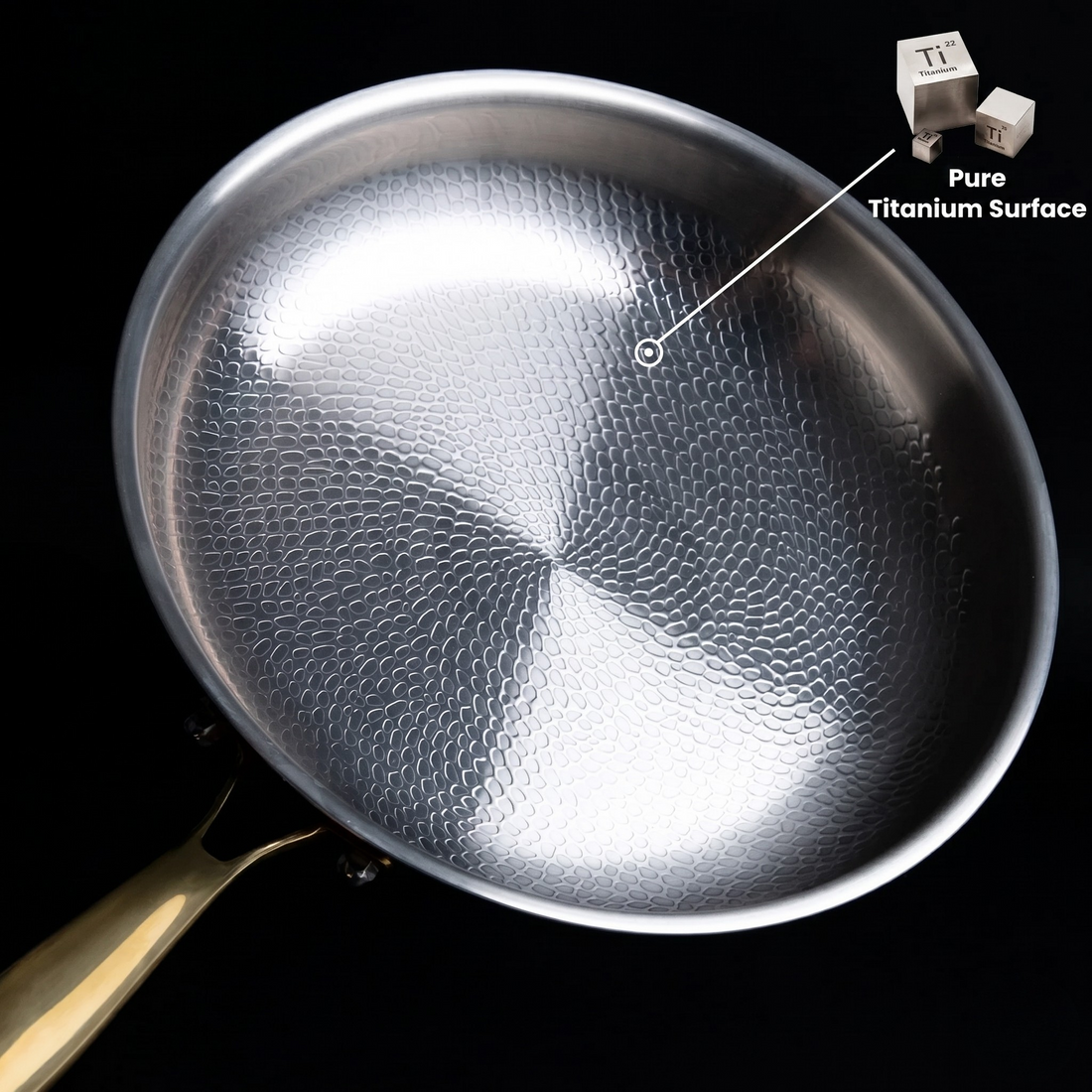 Pure titanium cookware pros and cons: a Kaizen pan on a kitchen surface